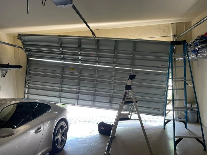 Off-Track Garage Door Repair Cougar of Gilman